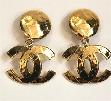 chanel gold dangling earrings|vintage Chanel dangle earrings.